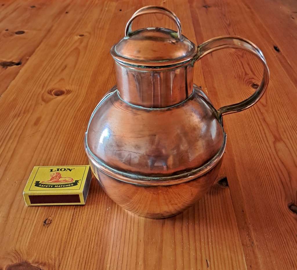 Vintage copper milk jug