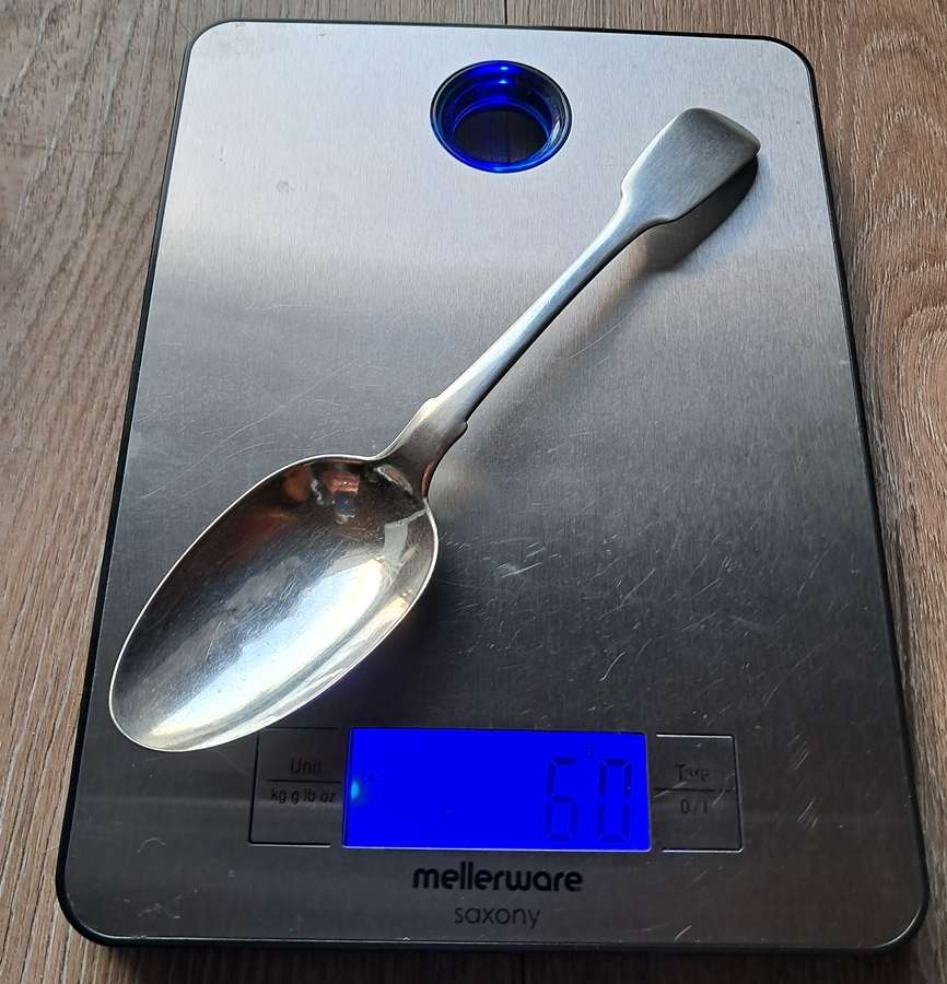 Solid silver dessert spoon by a Cape silversmith