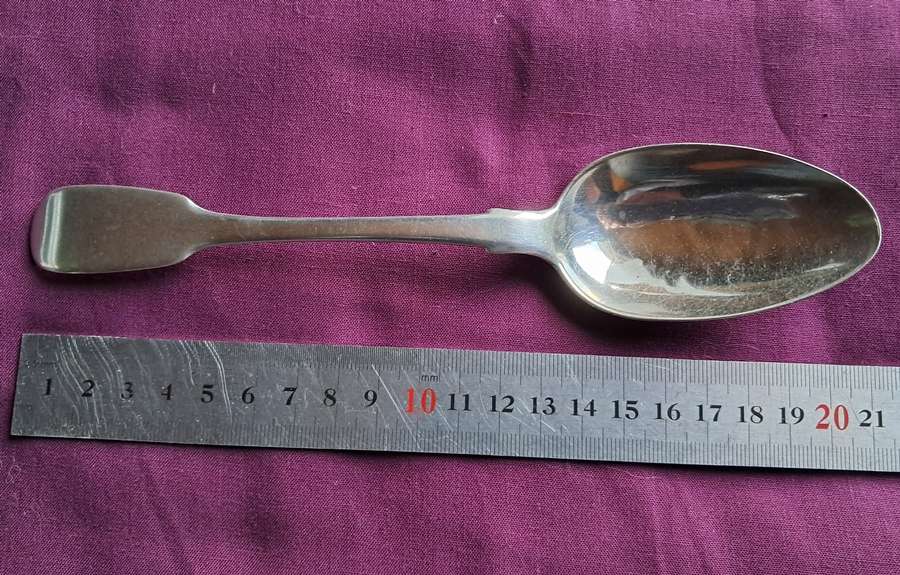 Solid silver dessert spoon by a Cape silversmith