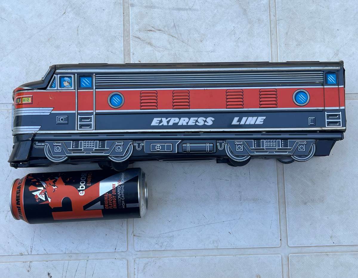 Vintage tin locomotive toy. NOT TESTED.