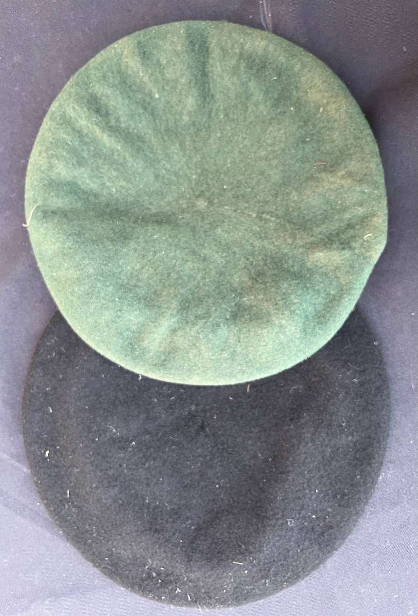 SADF Berets. One with badge, black one with no badge.