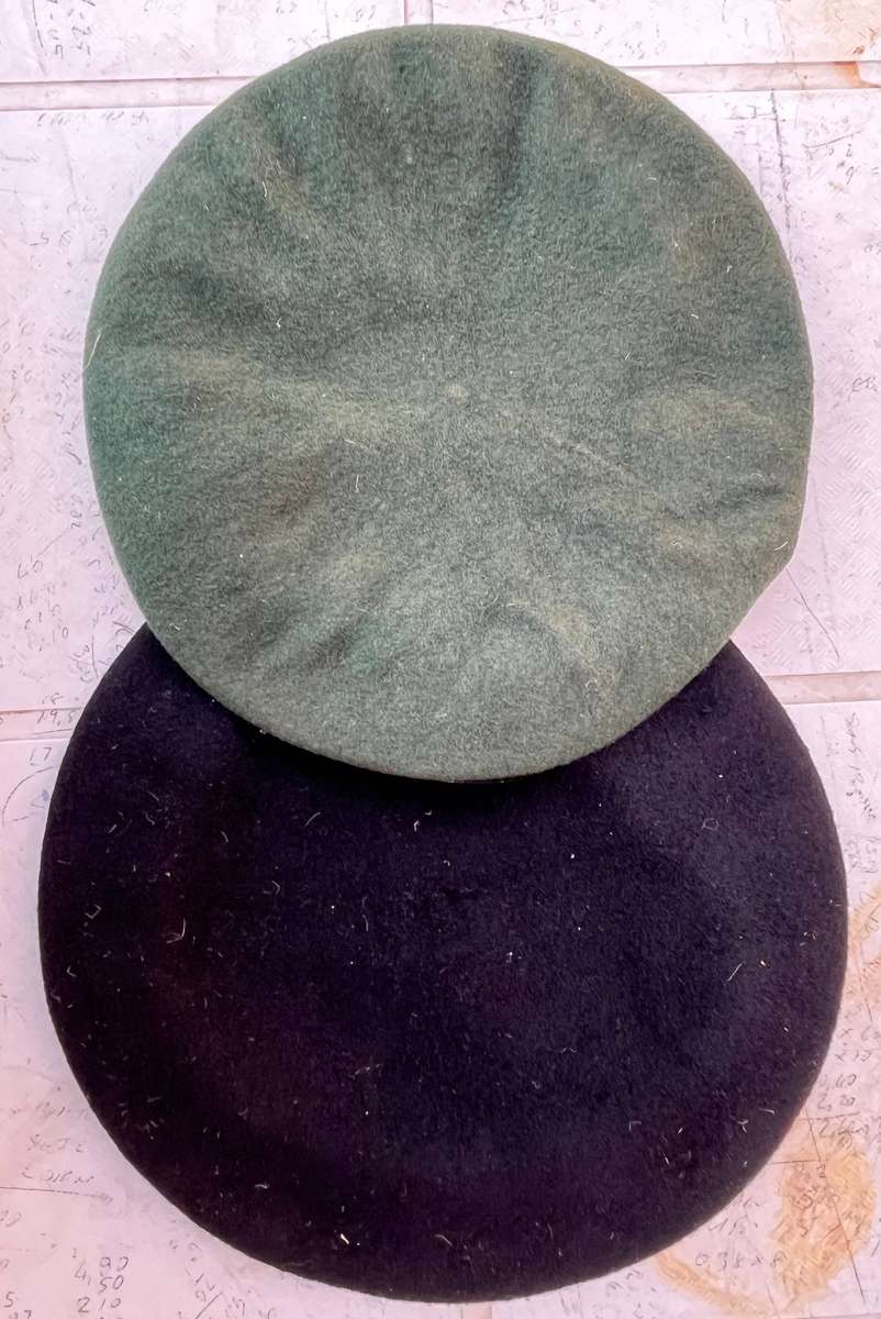 SADF Berets. One with badge, black one with no badge.
