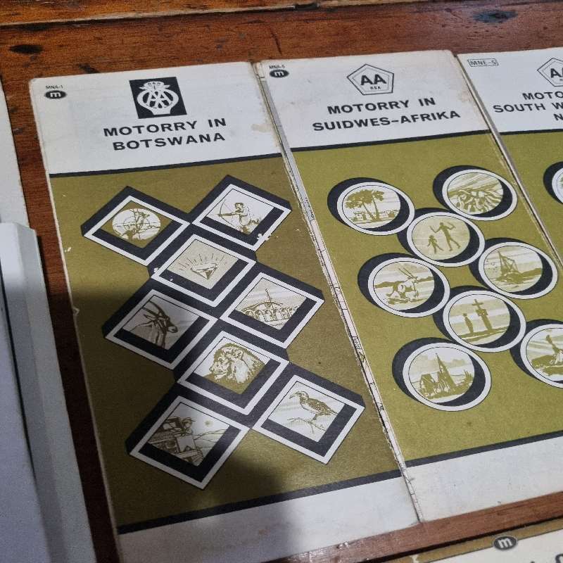 Vintage AA holder with 9 maps including Botswana and Namibia