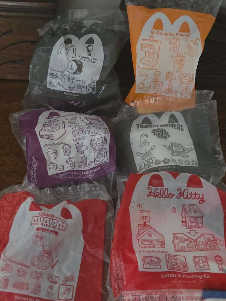 6 x MacDonald's Toys - Unopened -  incl. Hello Kitty, Transformers, Fifa World Cup 2022 etc.