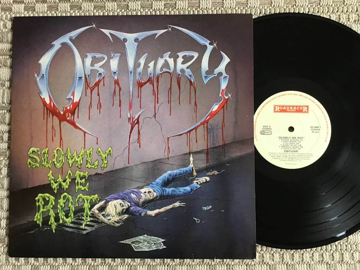 Obituary Slowly We Rot Lp