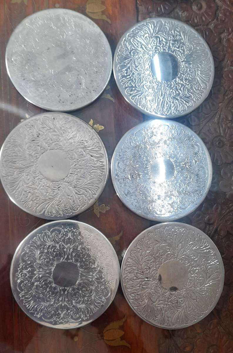 6 Beautiful Vintage Silver Coasters with holder. (see photos)