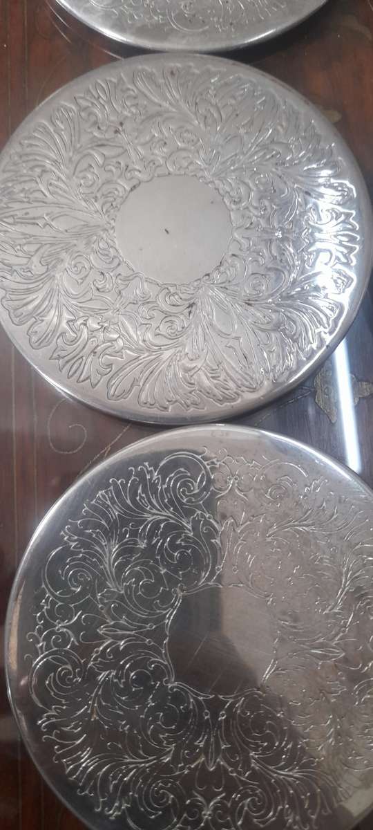 6 Beautiful Vintage Silver Coasters with holder. (see photos)