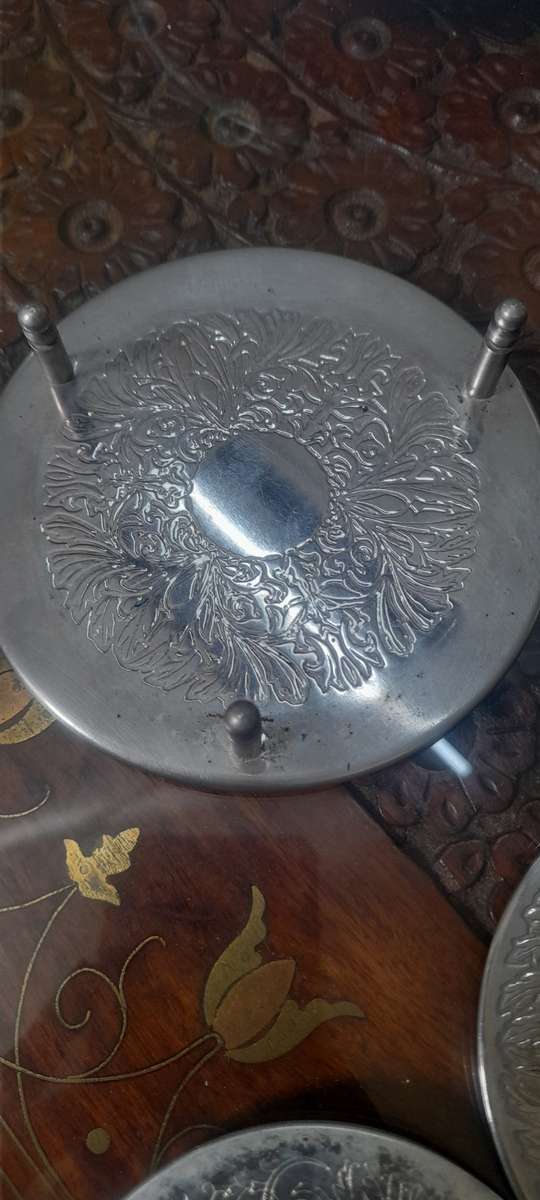 6 Beautiful Vintage Silver Coasters with holder. (see photos)