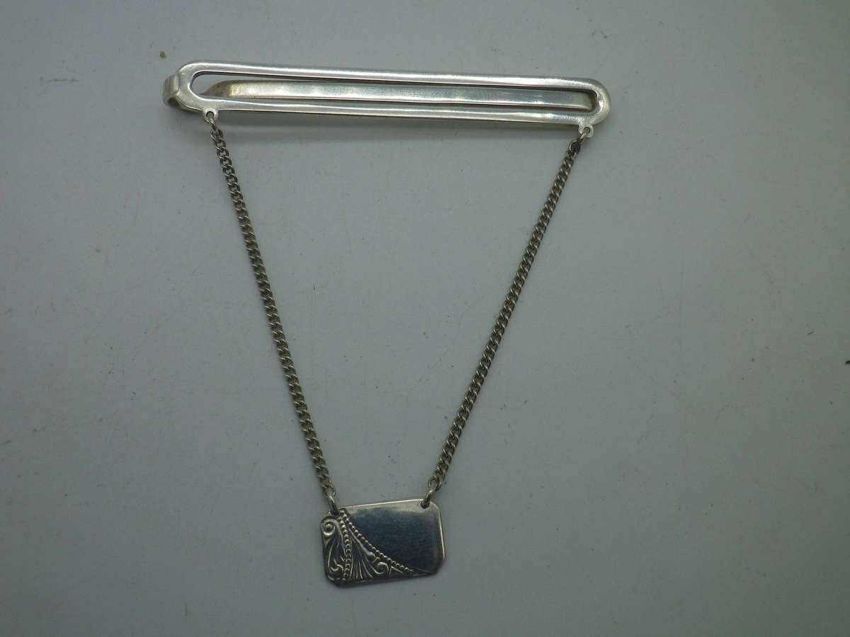 Hallmarked Sterling Silver Ladies Tie or scarf pin with medallion for engraving initials. 7cm. 8.21g