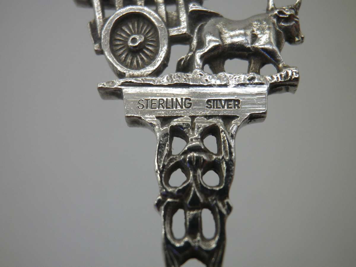 Sterling Silver FIGURAL Souvenir spoon, Malaysia. Bull Drawing cart. 11.2 grams. 11cm long