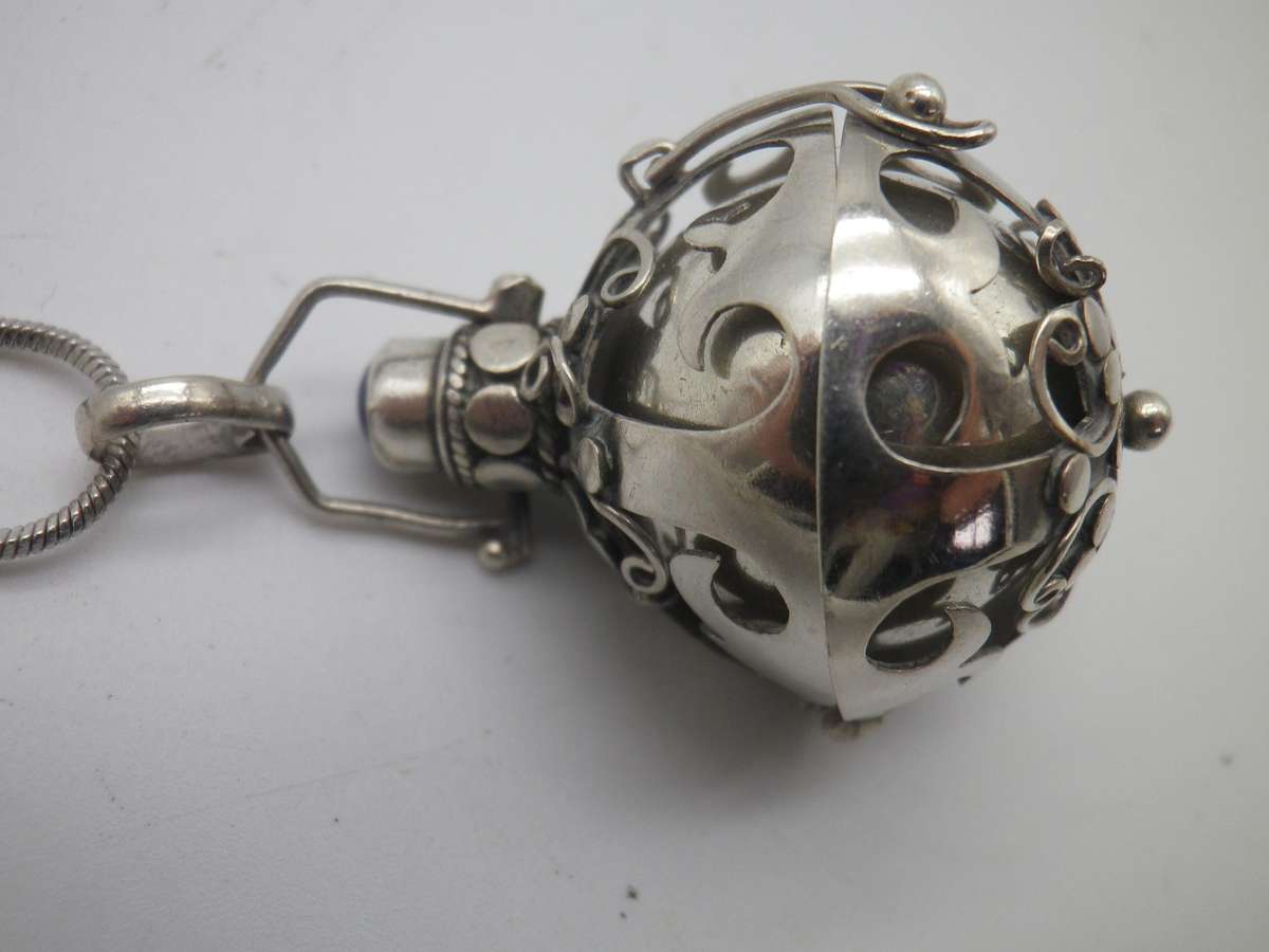 Sterling Silver Vintage Necklace - ball in cage on silver chain.