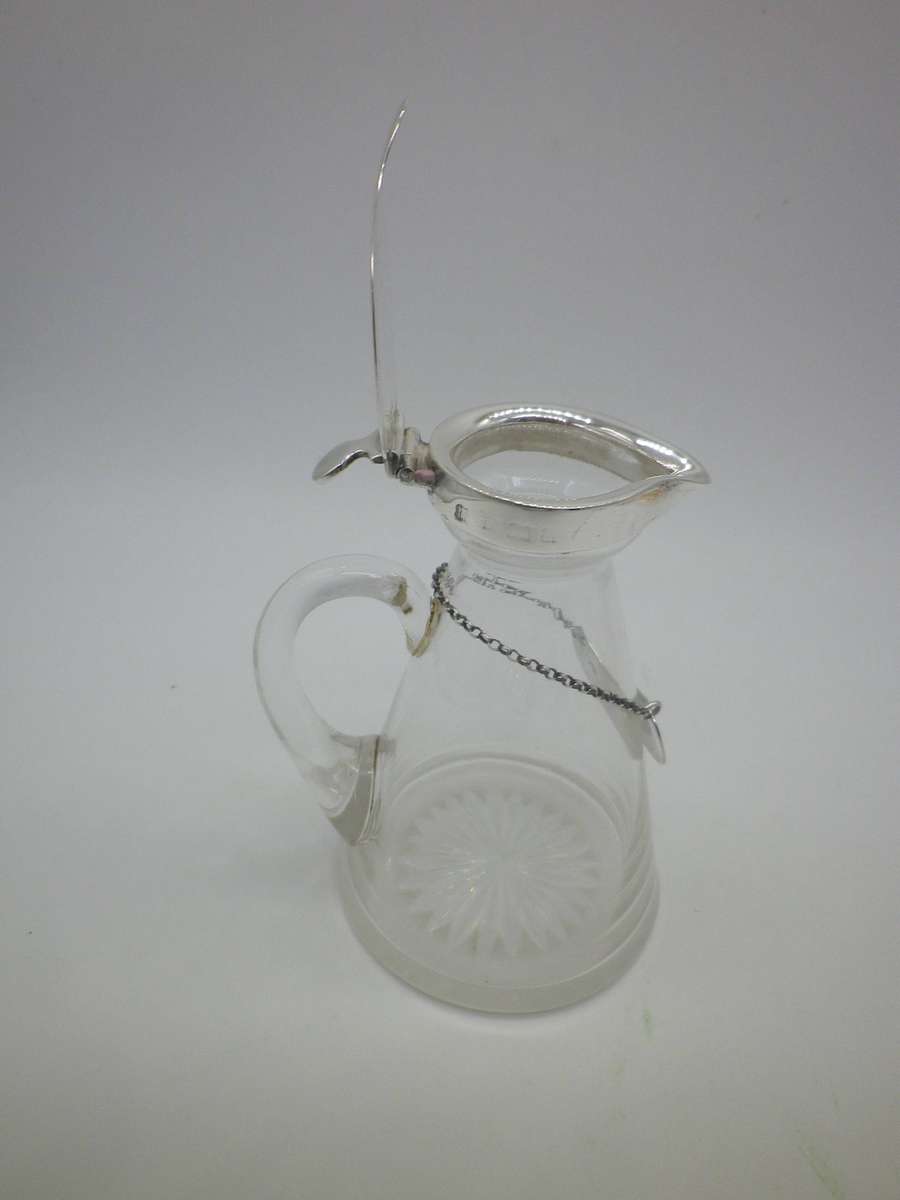 Rare Whiskey Noggin with hallmarked silver lid and label.  London, 1896. 11cm