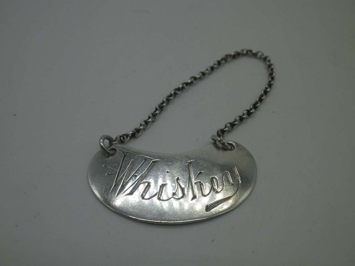 Rare Whiskey Noggin with hallmarked silver lid and label.  London, 1896. 11cm