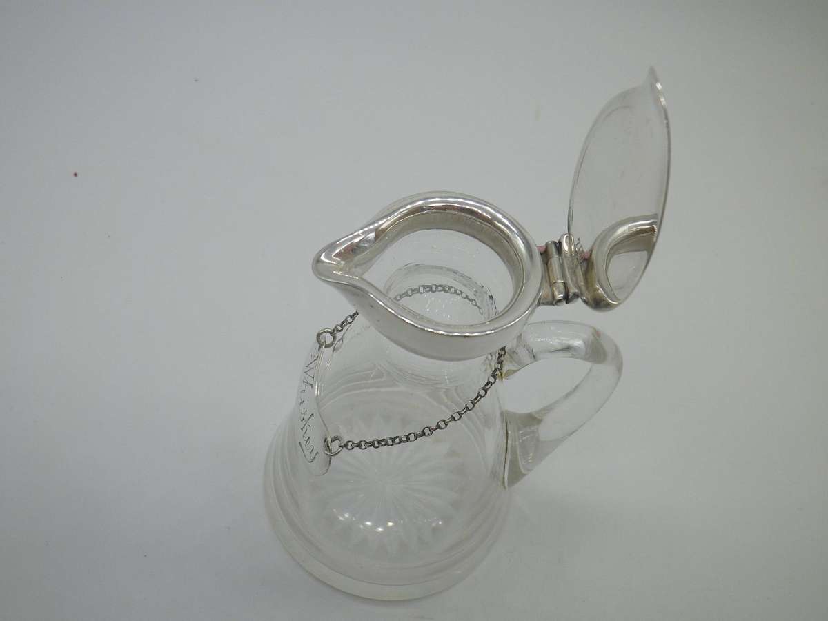 Rare Whiskey Noggin with hallmarked silver lid and label.  London, 1896. 11cm