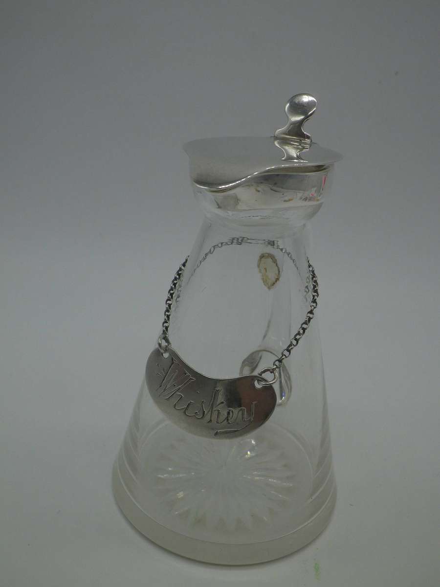 Rare Whiskey Noggin with hallmarked silver lid and label.  London, 1896. 11cm