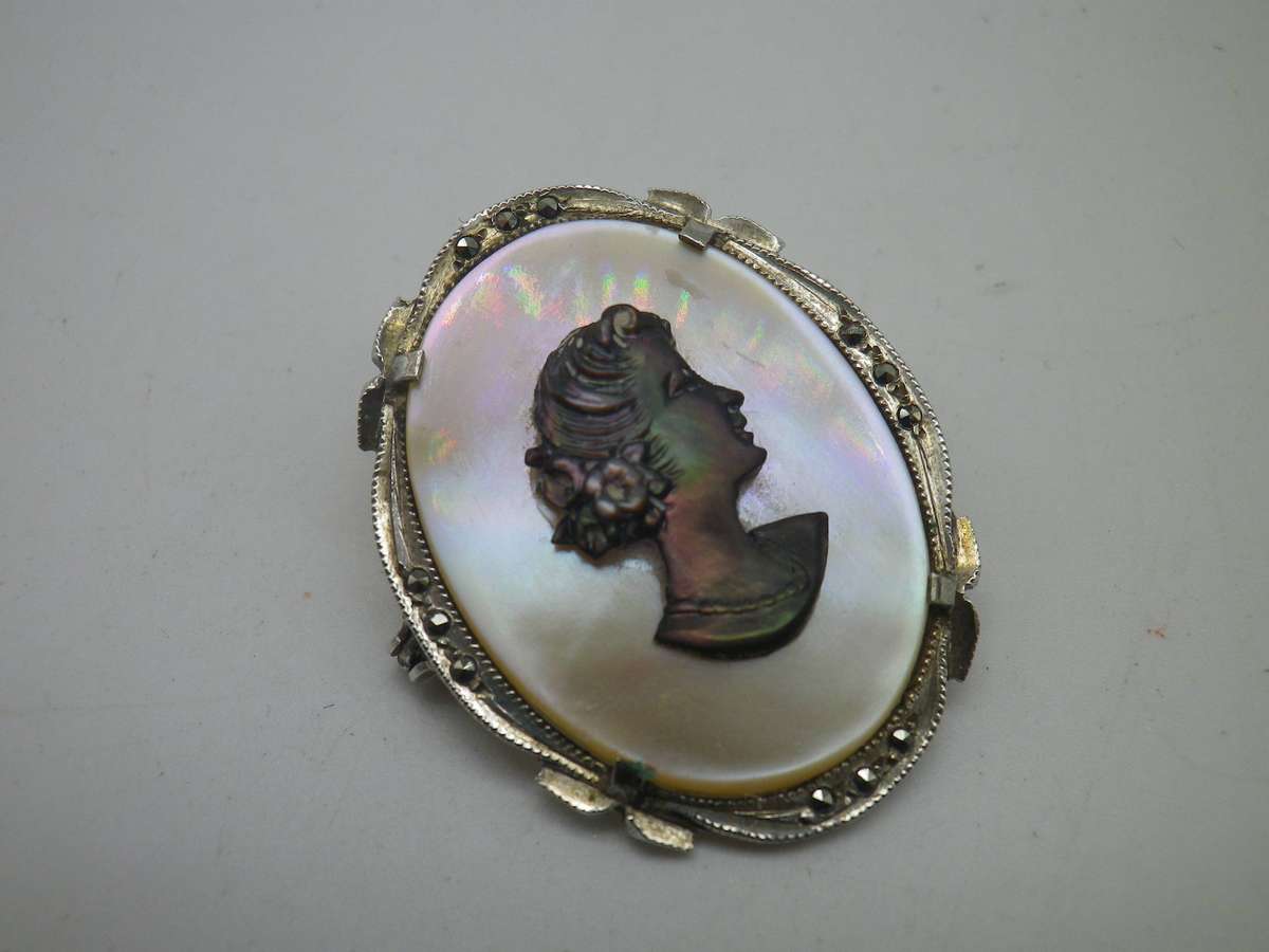 Unusual Vintage 800 Silver & Marcasite Cameo Pendant or brooch. Genuine shell