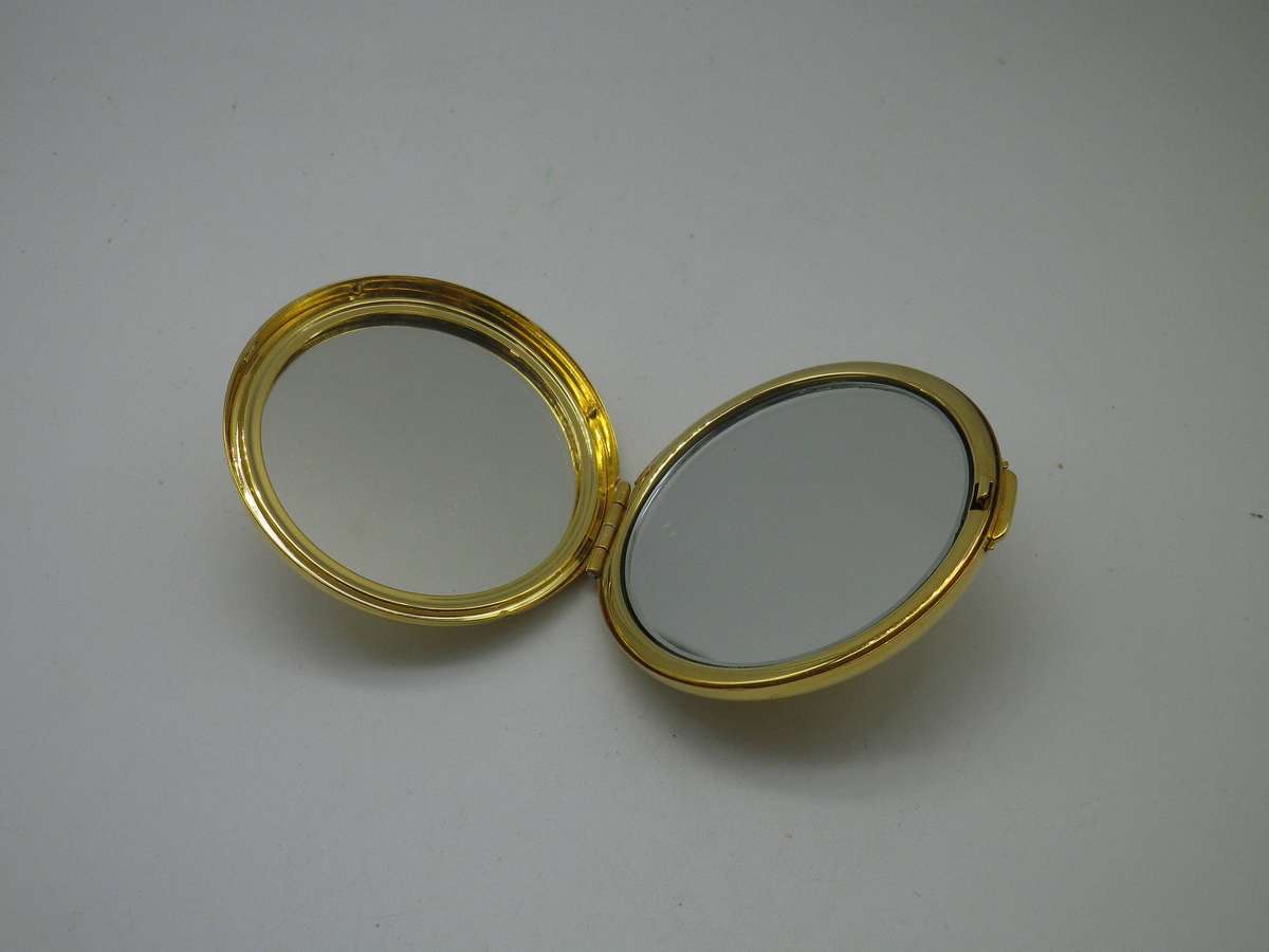 Vintage Gold Tone double pocket mirror. Good Quality. One side magnifying. 6cm