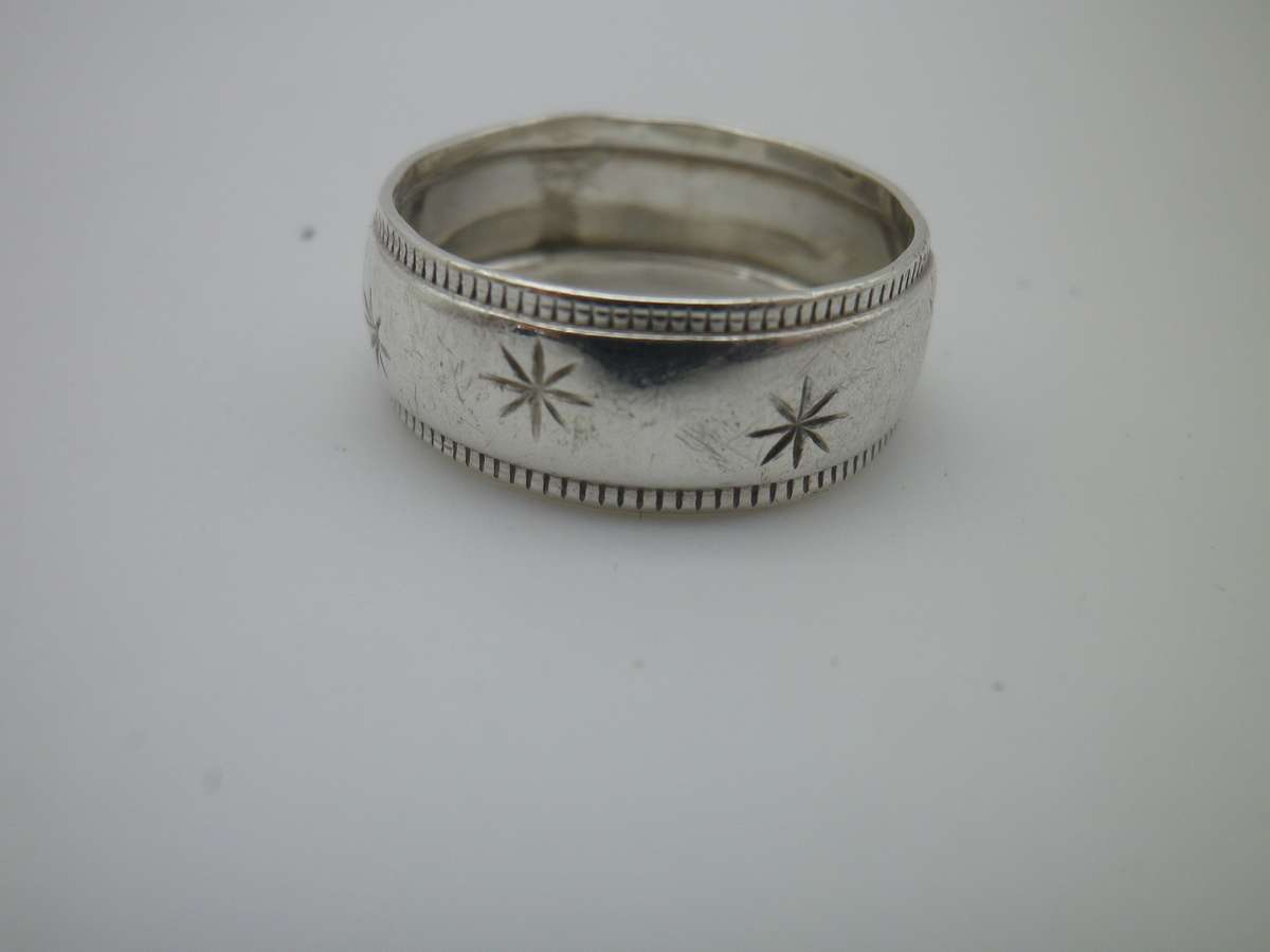Sterling Silver Vintage Designer Ring.  Well made. Little engraved stars 2.7 grms Size: O 1/2