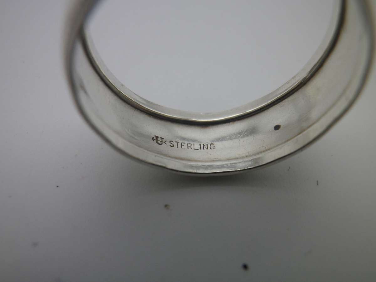 Sterling Silver Vintage Designer Ring.  Well made. Little engraved stars 2.7 grms Size: O 1/2