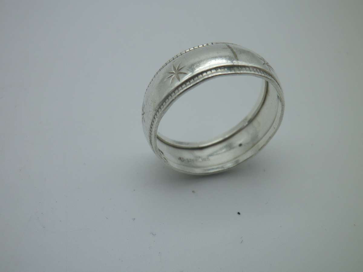 Sterling Silver Vintage Designer Ring.  Well made. Little engraved stars 2.7 grms Size: O 1/2