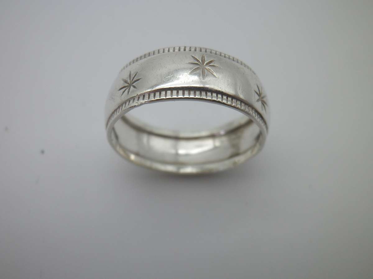 Sterling Silver Vintage Designer Ring.  Well made. Little engraved stars 2.7 grms Size: O 1/2