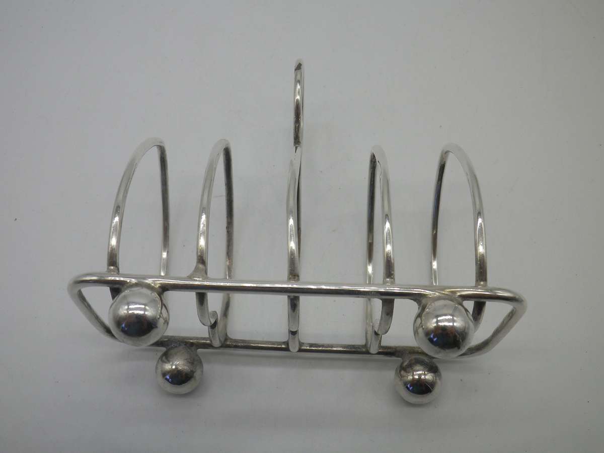 Hallmarked Sterling Silver 4 slice Toast Rack. Sheffield, 1915. Walker & Hall 62.30 g