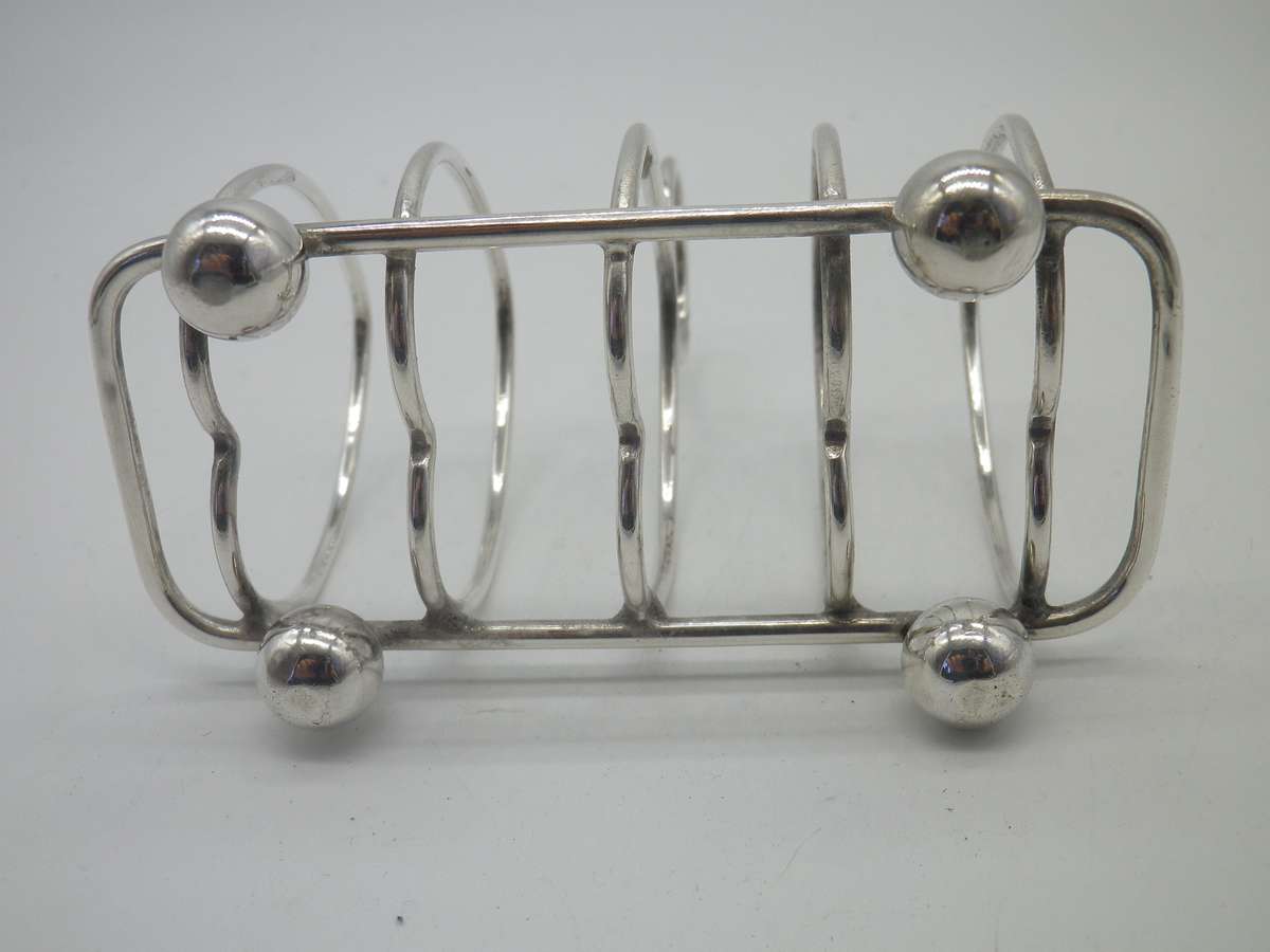 Hallmarked Sterling Silver 4 slice Toast Rack. Sheffield, 1915. Walker & Hall 62.30 g