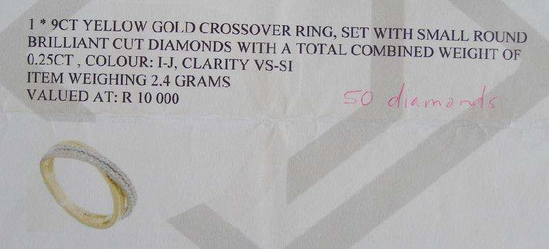 Gorgeous 9ct Gold cross over ring. 50 brilliant cut diamonds. Size O. 2.4g Valuation certificate.