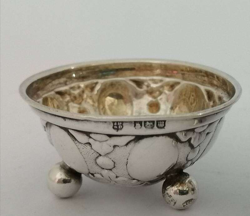 Pair Hallmarked Sterling Silver Repousse open salts. Sheffield 1904. 4.7cm x 2.5. 20.4g