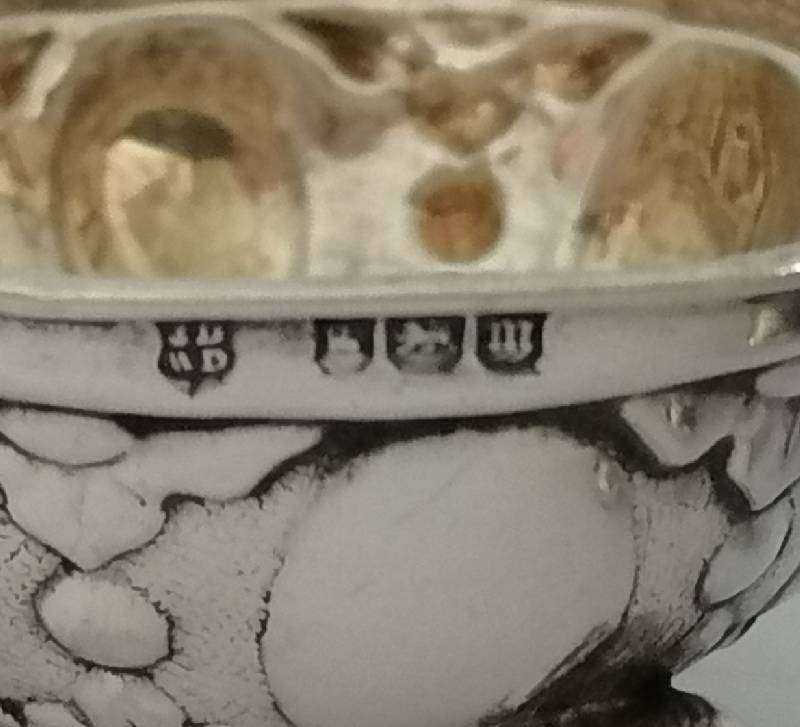 Pair Hallmarked Sterling Silver Repousse open salts. Sheffield 1904. 4.7cm x 2.5. 20.4g