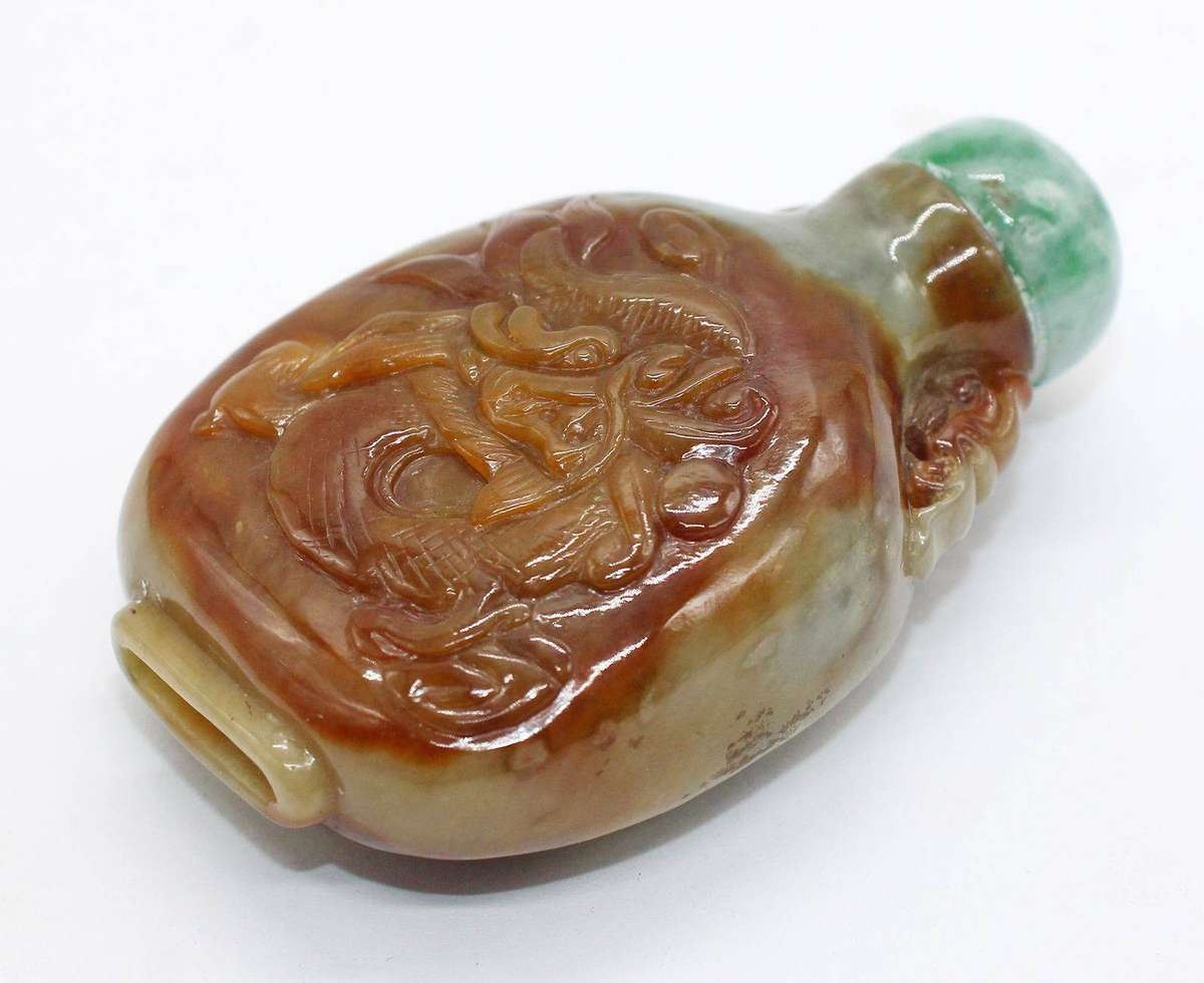 CHINESE 20th Century jade 'Horse and Dragon' snuff bottle. 7cm
