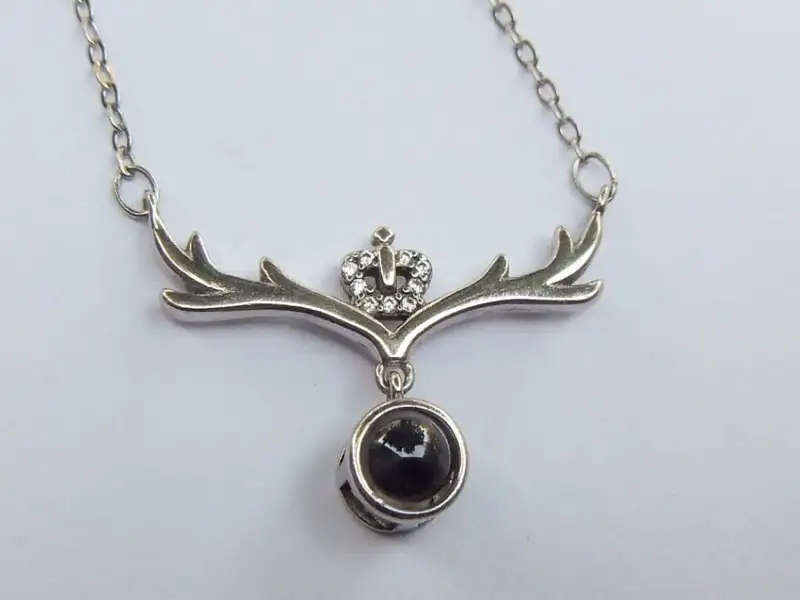 Unusual STERLING SILVER STANHOPE NECKLACE. Says "I love you" in many languages