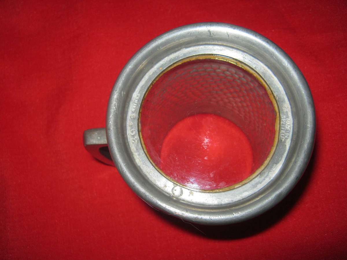 Pewter antique glass bottom small beer mug holds just more than 300ml. Sheffield made.