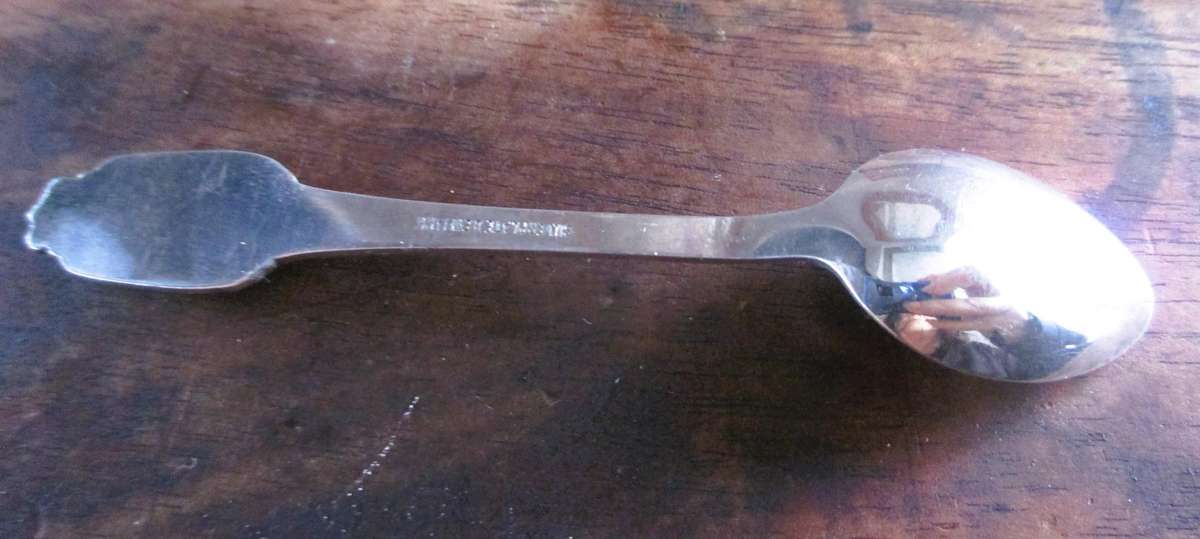 6 small Greetings from Denmark Silverplate Spoons in box.