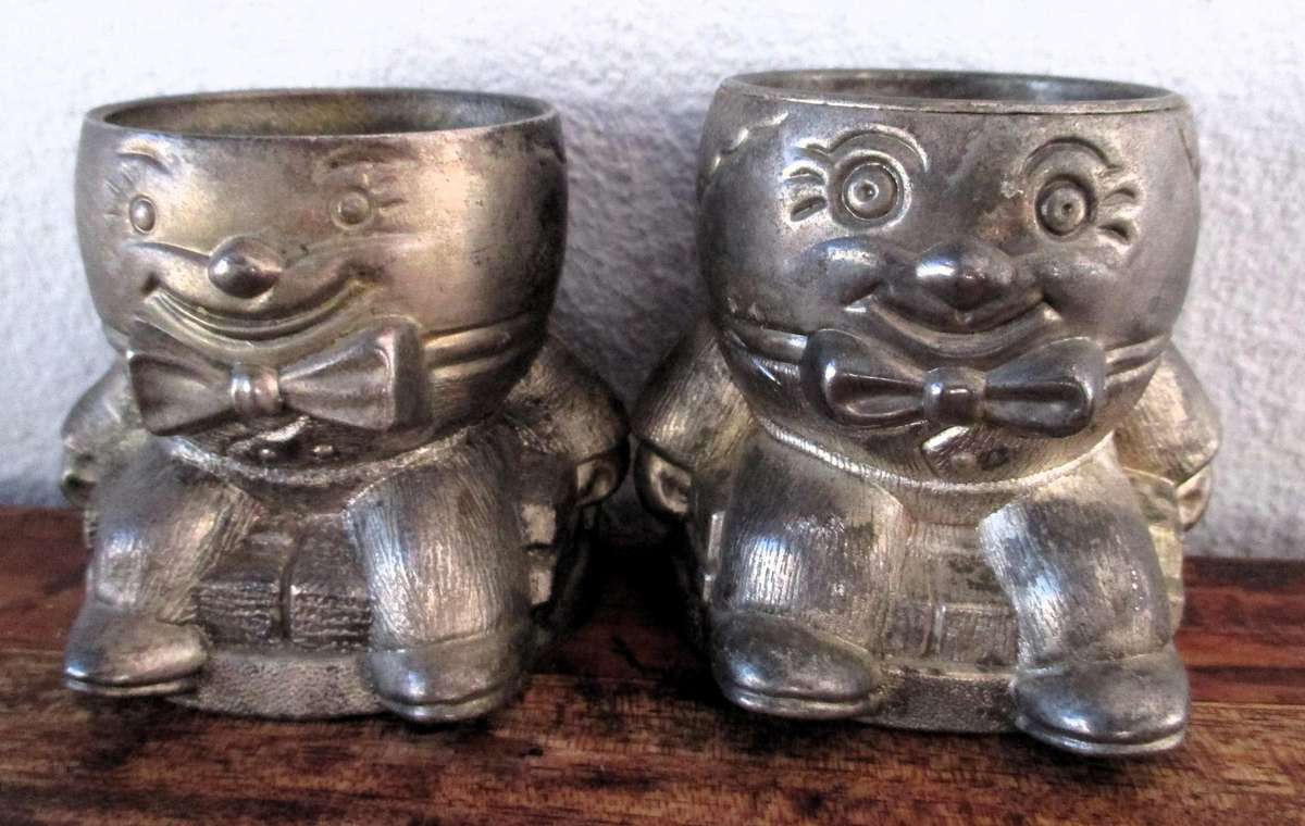 2x Vintage Humpty Dumpty Silver Plated/Pewter Egg Cup. Collectable. 60mm high.
