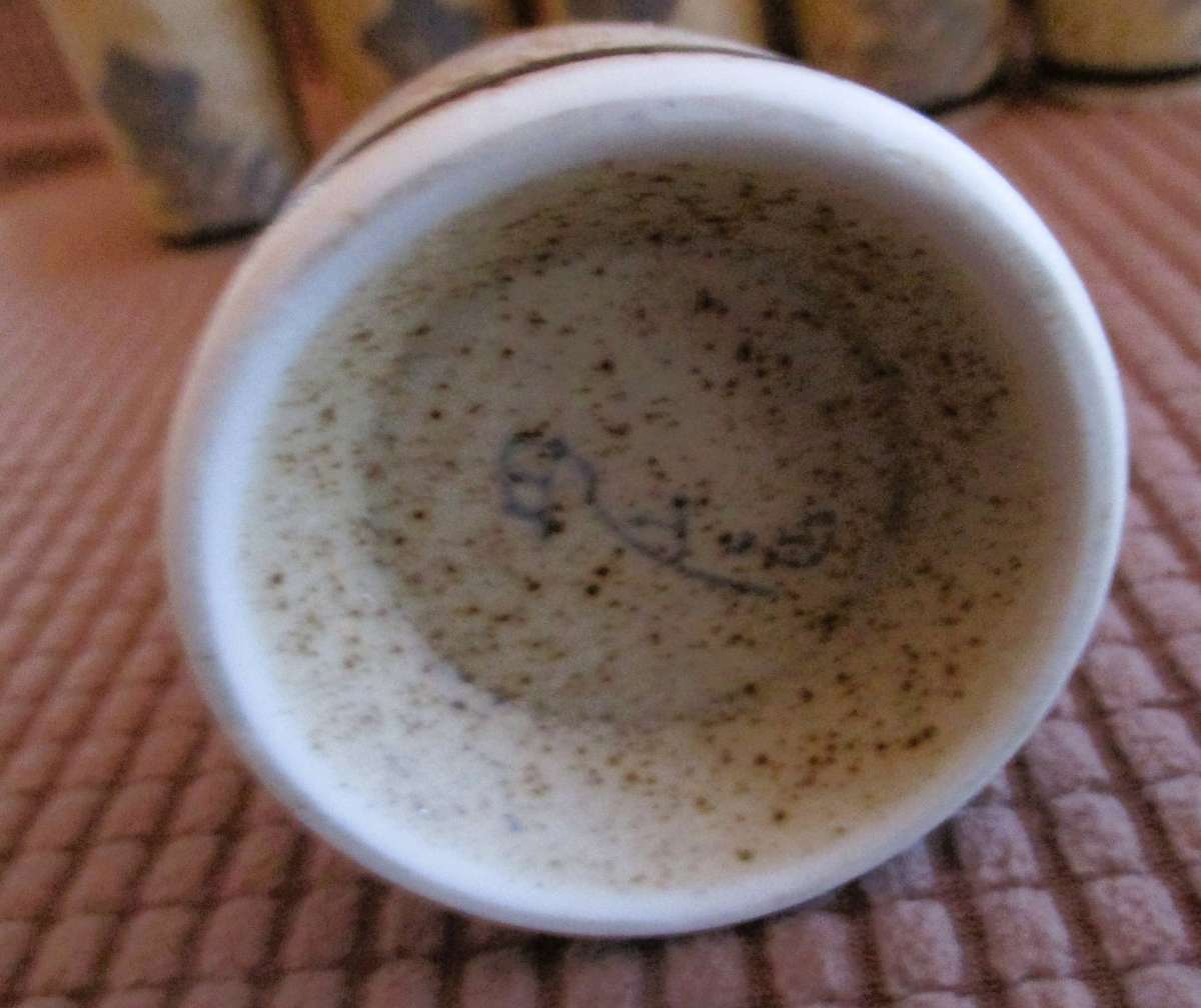 Set of three sake pitchers (tokkuri) and six small sake cups (ochoko).