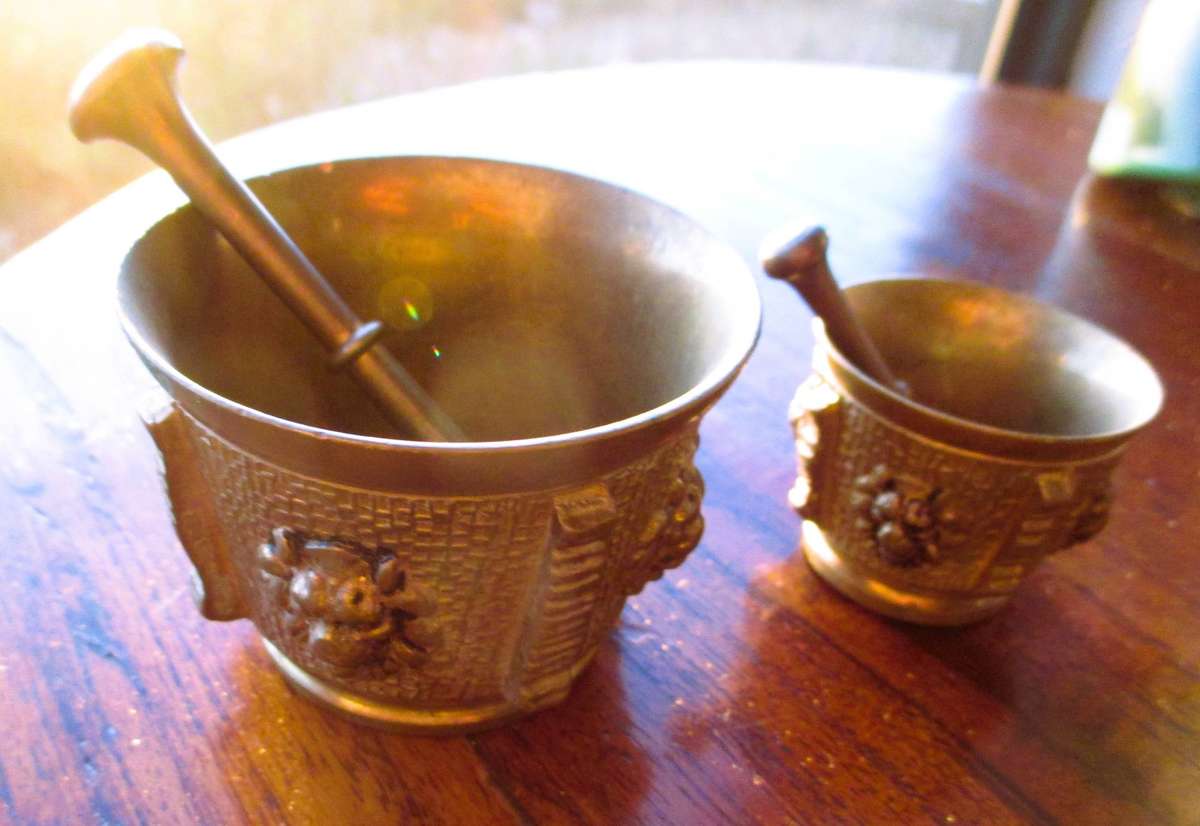 2 x Vintage brass mortar and pestle set, distinctive lion head Embossed.