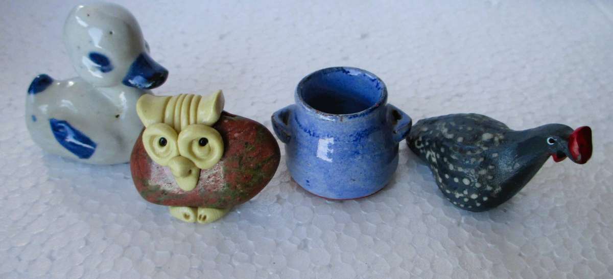 Lot of 4 Miniature ceramic ornaments, including a blue and white painted duck.