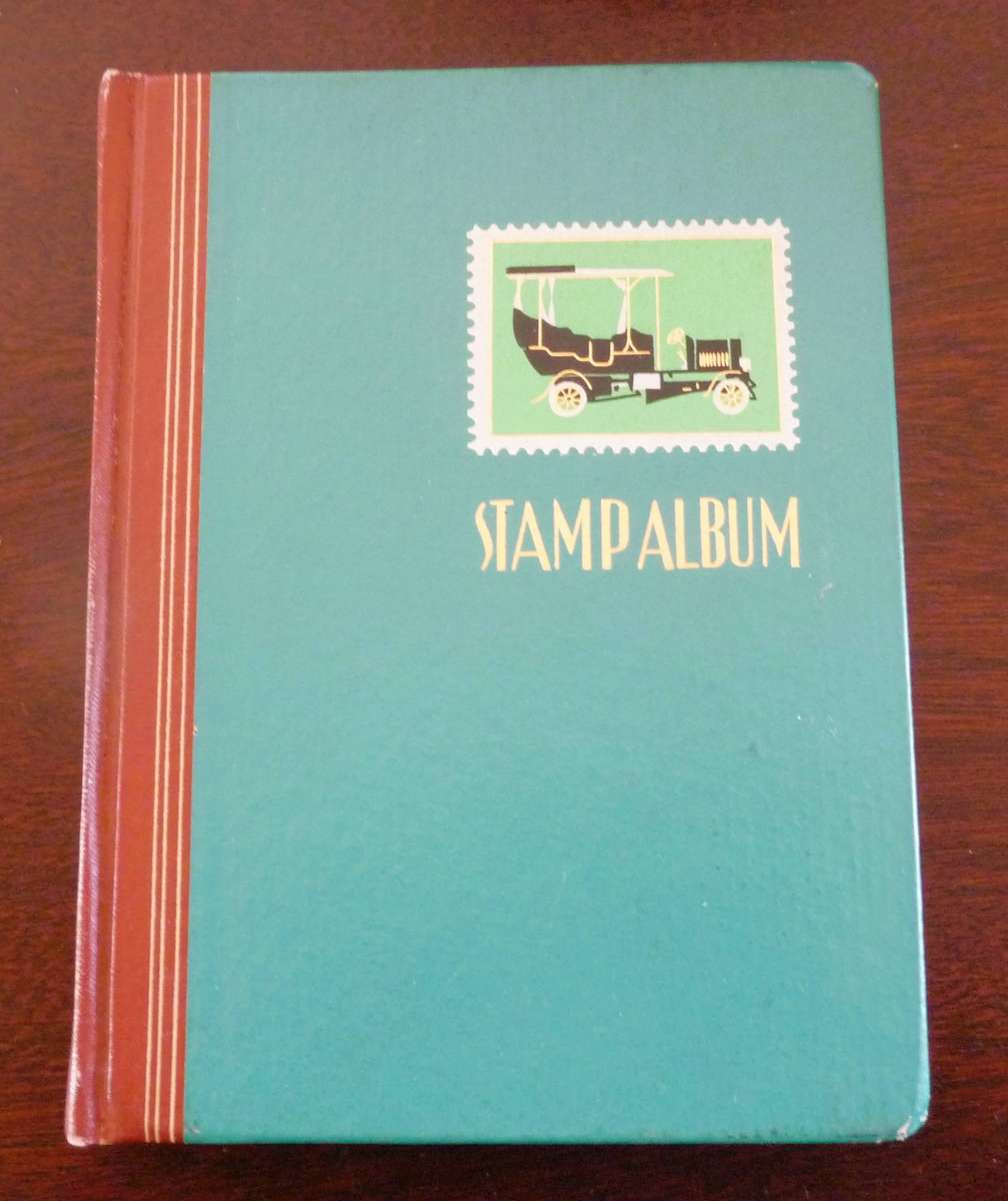 Vintage stamp abum with stamps, mainly QEII. 21x15cm