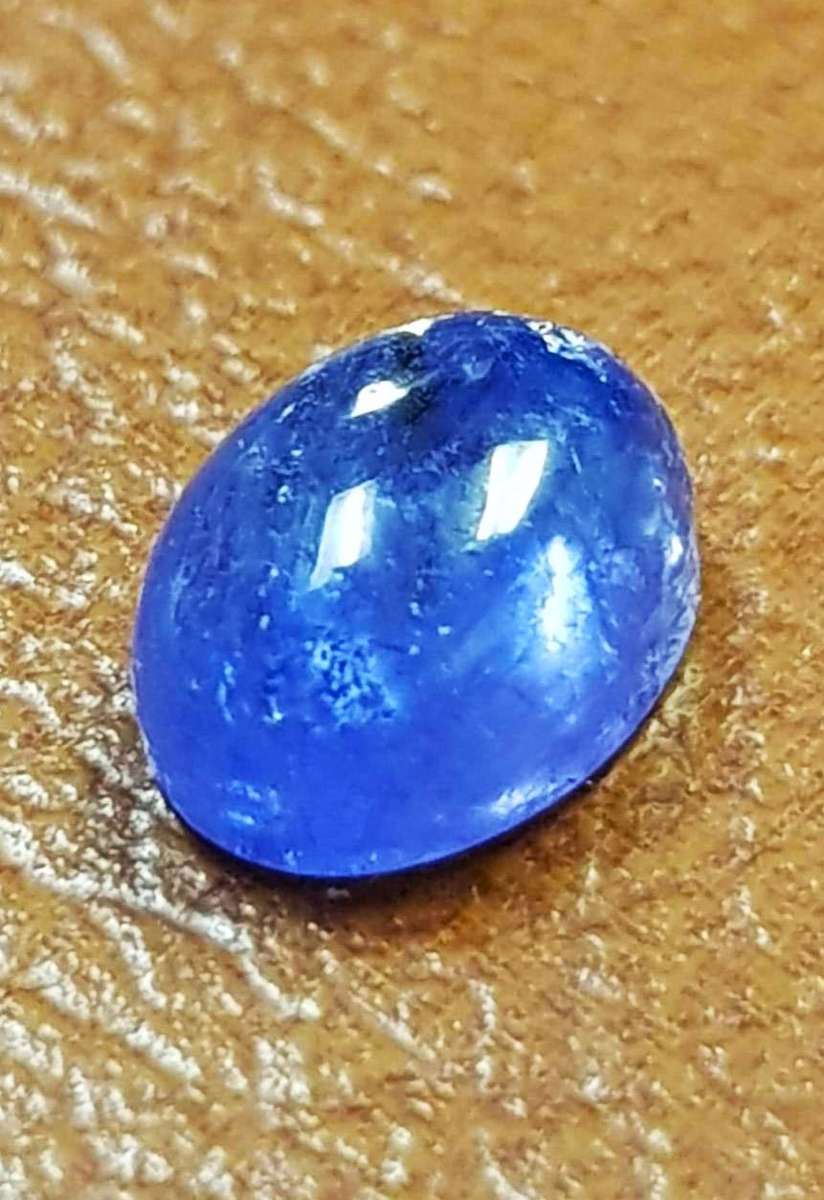 2.75Cts Tanzanite Purplish Blue  Oval Cabochon 7x9MM. Ravishing Colour & Full Fire!