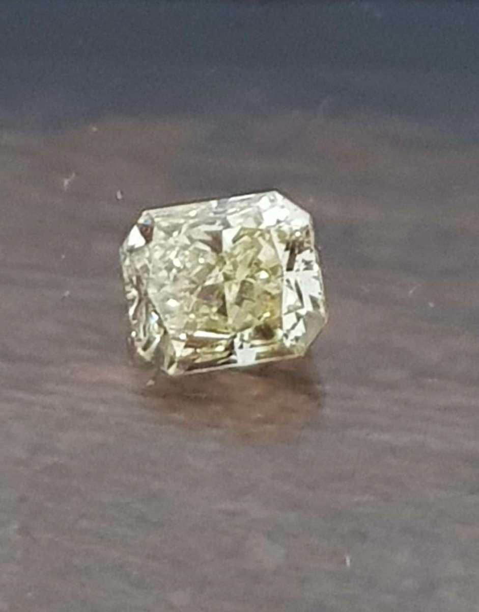0.41cts Diamond Radiant Cut K/VVS2 **Certified**Fancy Yellow