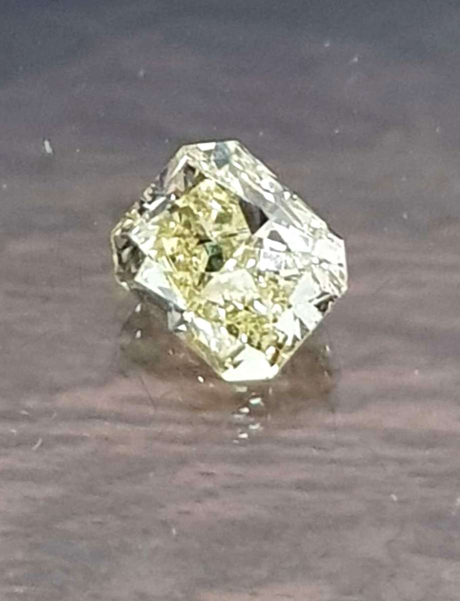 0.41cts Diamond Radiant Cut K/VVS2 **Certified**Fancy Yellow