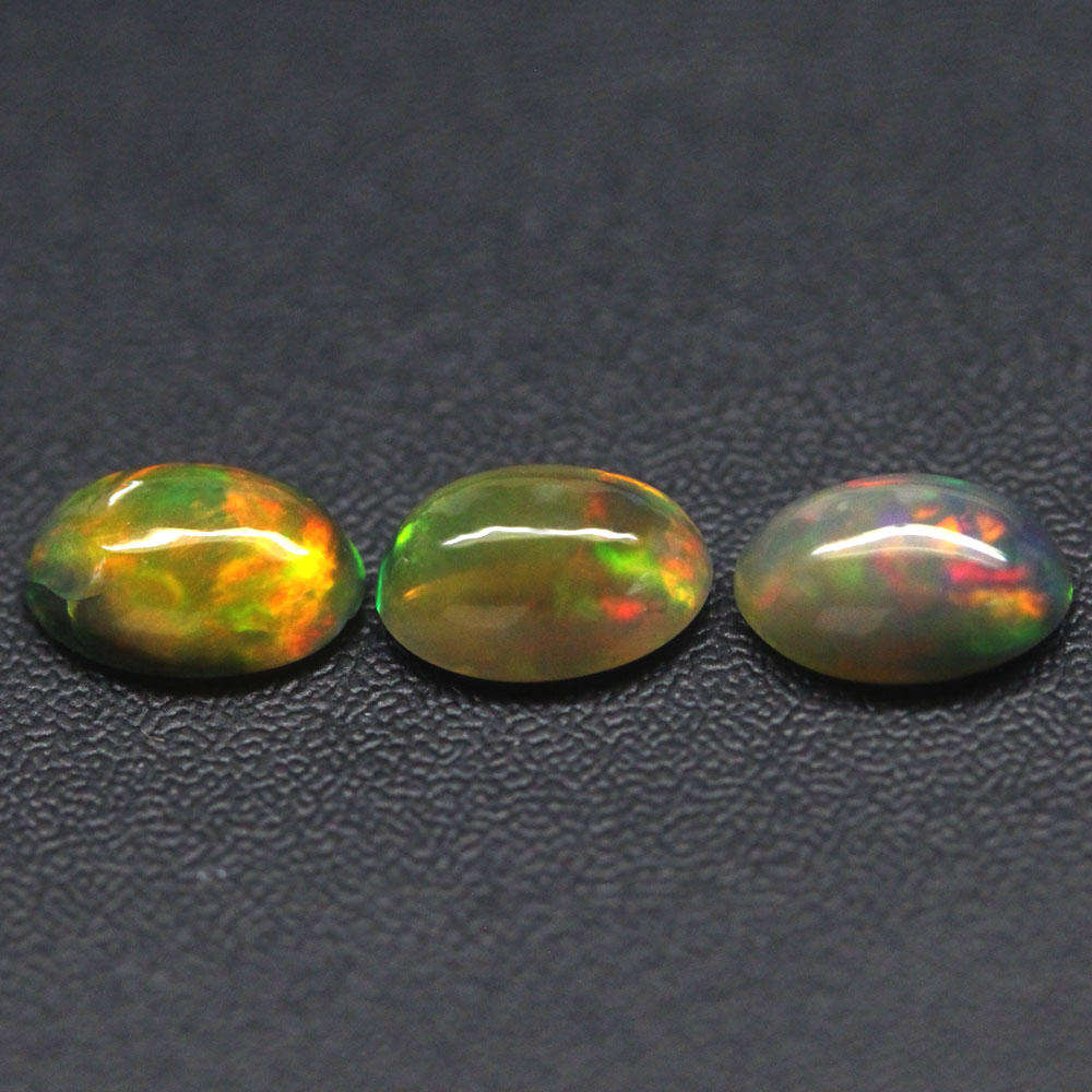 0.97Ct.  Opal Oval Cabochon 3 Pieces Multi Colors Glittering Rainbow 3D Ethiopian