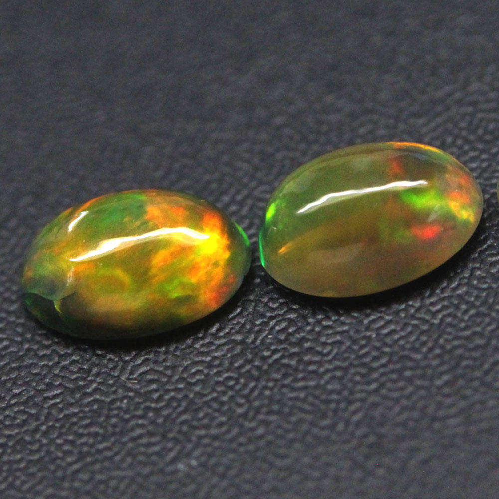 0.97Ct.  Opal Oval Cabochon 3 Pieces Multi Colors Glittering Rainbow 3D Ethiopian