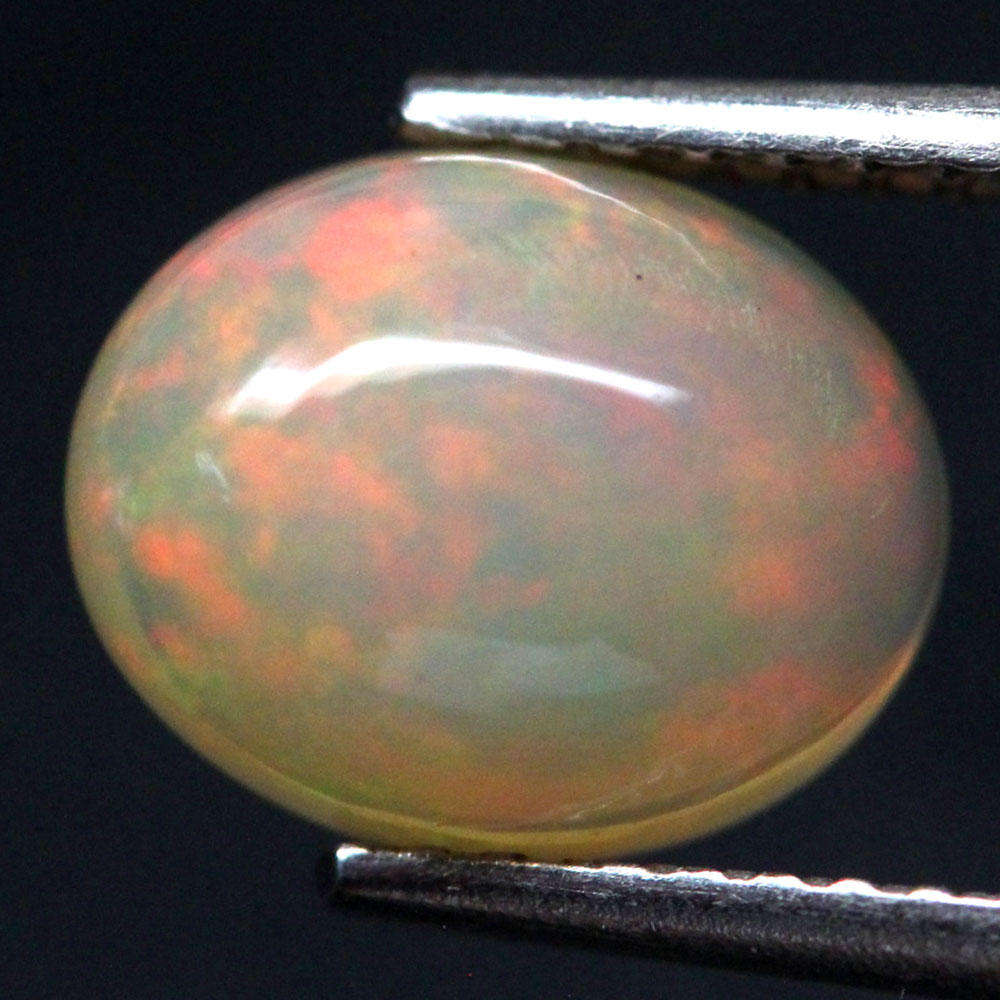 1.51Ct.  Opal Multi Colors Oval Cabochon Untreated Welo, Ethiopian Natural