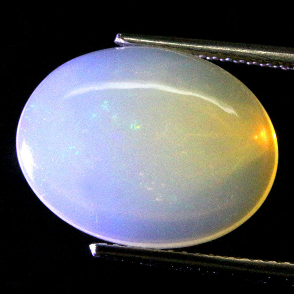 4.22Ct.  Opal Oval Cabochon Multi Colors Glittering Rainbow 3D Ethiopian