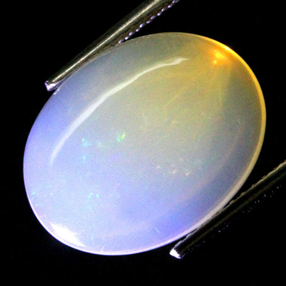 4.22Ct.  Opal Oval Cabochon Multi Colors Glittering Rainbow 3D Ethiopian
