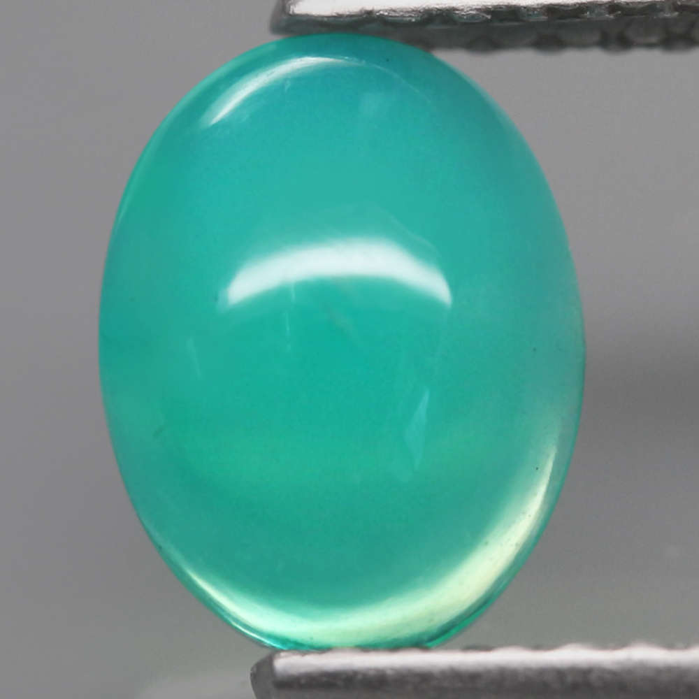 0.65Ct.  Opal Oval Cabochon Multi Colors Glittering Rainbow 3D! Ethiopian Natural