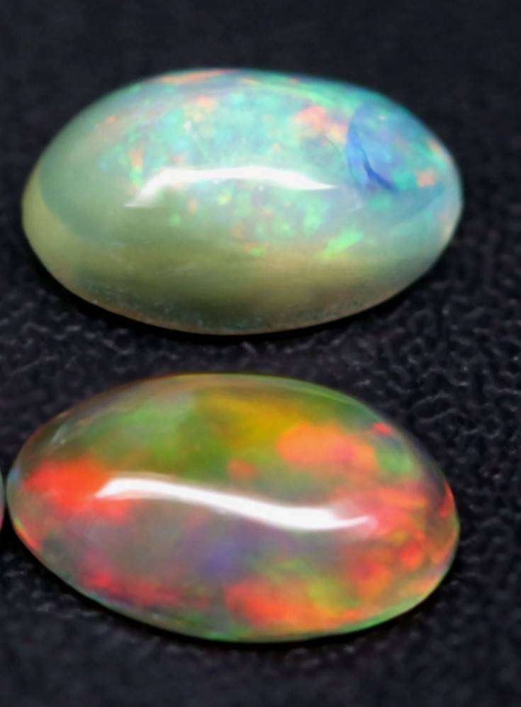 1.21Ct.Opal Oval Cabochon **4 Pieces**Multi Colors Glittering Rainbow 3D! Ethiopian  Natural