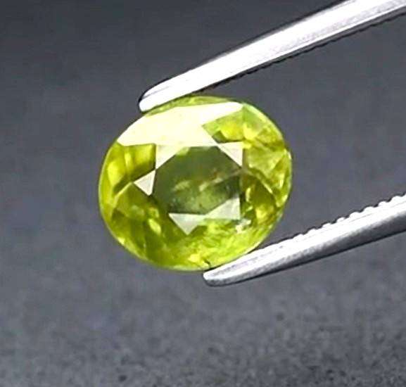 1.14ct Yellowish Green Sphene  Oval 6.5x5.7mm Natural Gemstone, Adamantine Luster